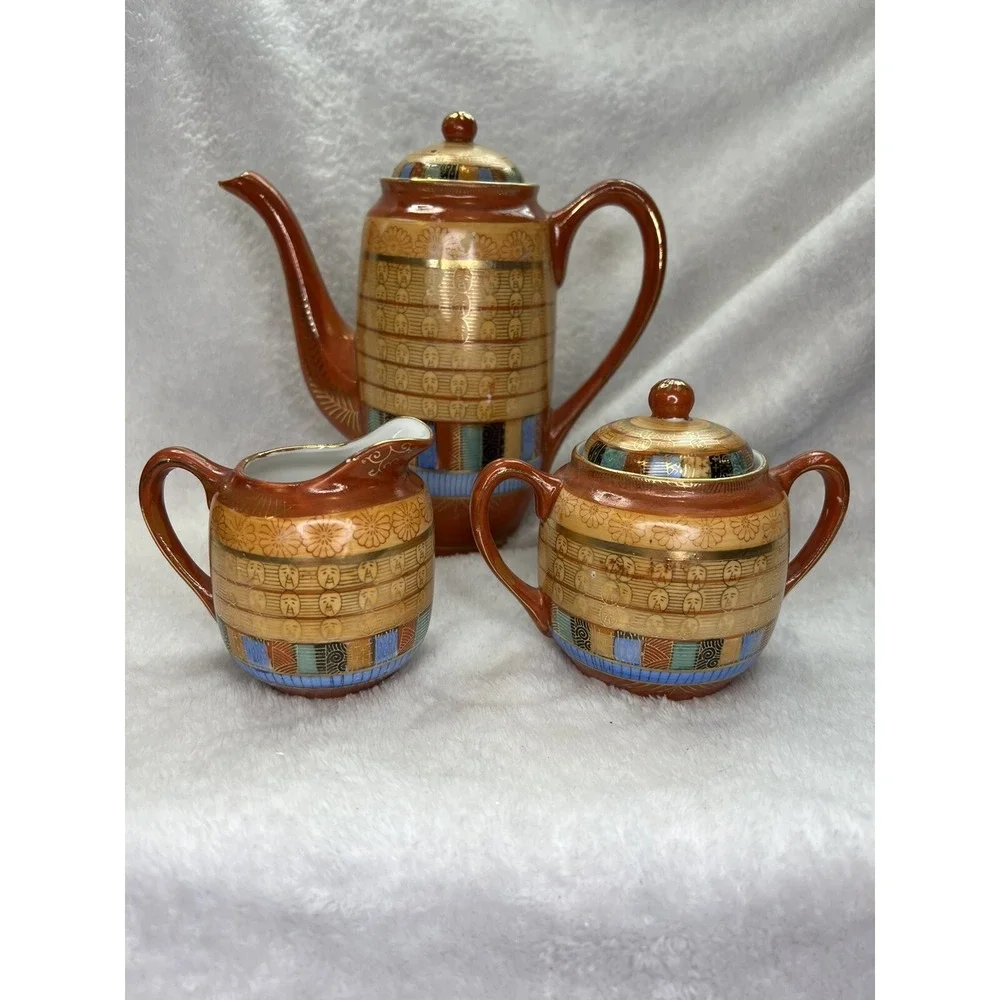 AA Importing Co Tea Set‎ Japan Thousand Faces Gold Porcelain 13pc Set Terracotta